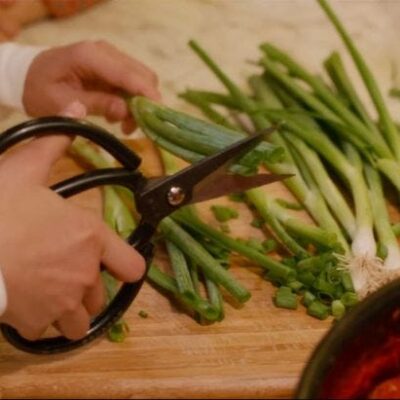 Cutting scallions with scissors in "Always Be My Maybe" | Image credit: Netflix