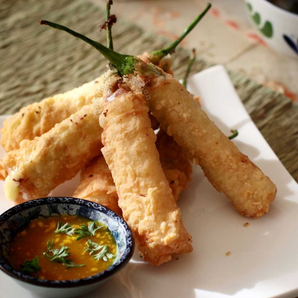 Cheese-stuffed chili spring rolls