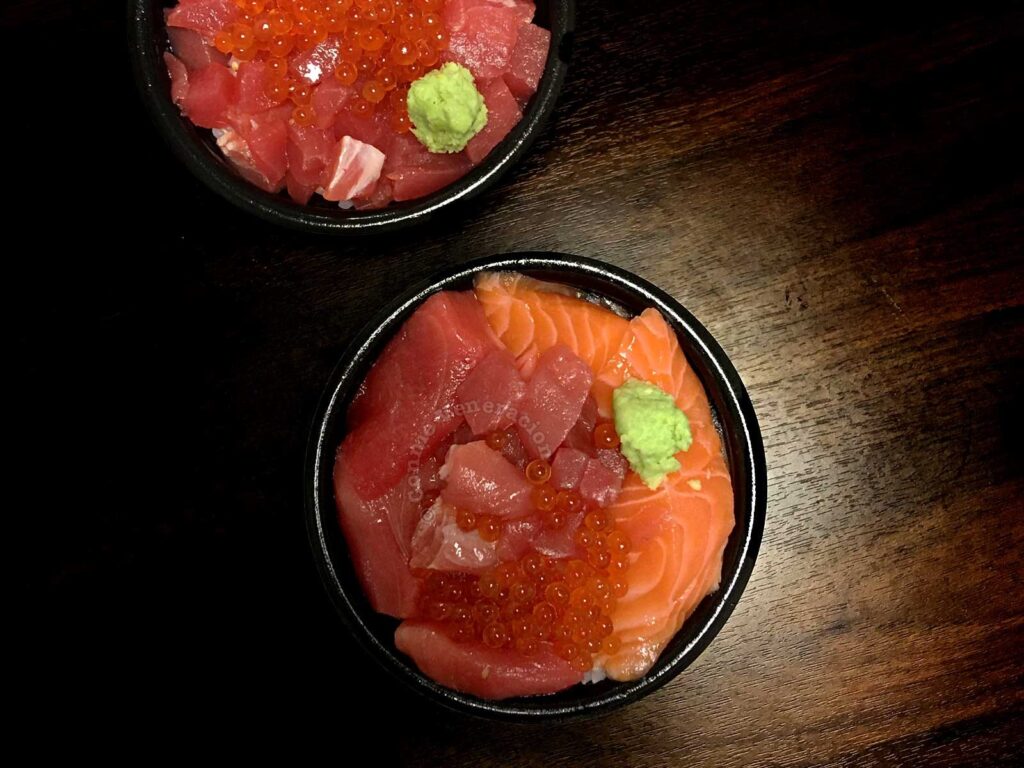 combination of ikuradon (with seasoned ikura or salmon roe) and hokkaidon (with thinly sliced salmon)