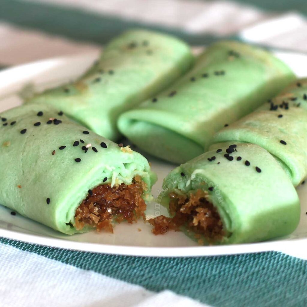 Pandan crepes with coconut and palm sugar filling (kuih dadar)