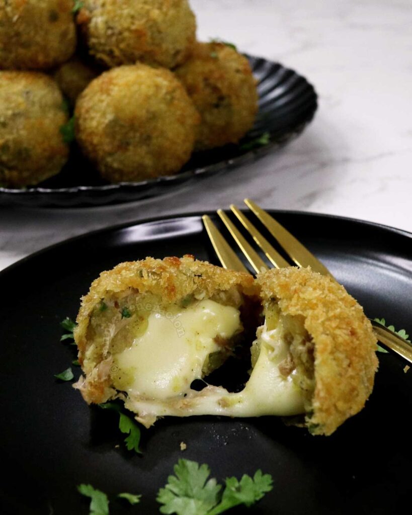 Cheese-stuffed tuna and potato balls