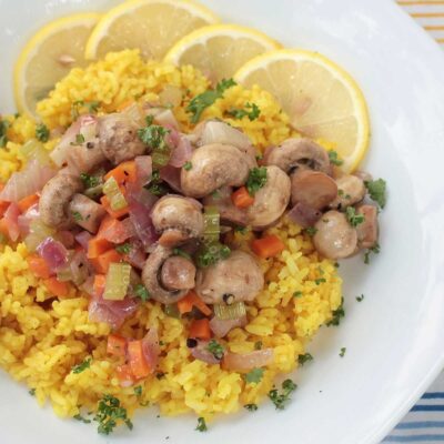 Lemon garlic mushrooms over mock saffron rice