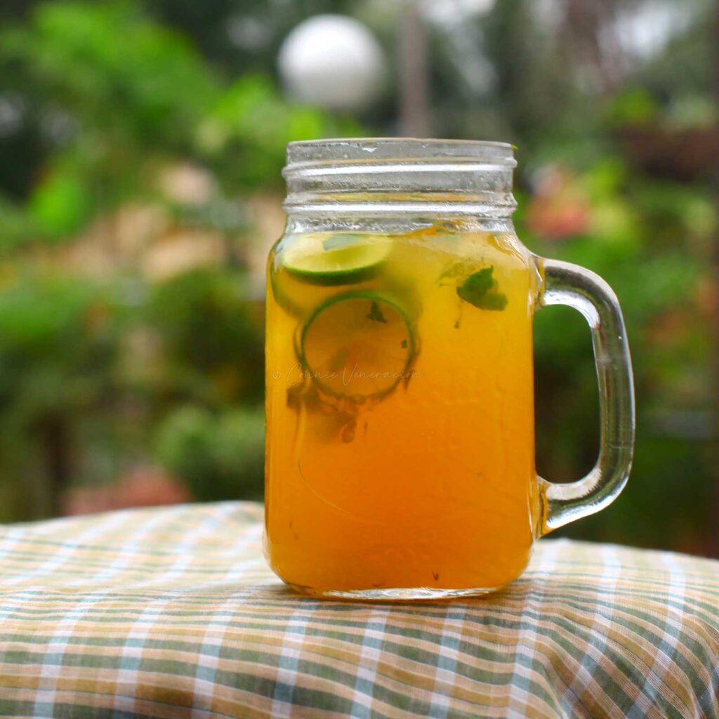 A tropical drink served in a Mason jar